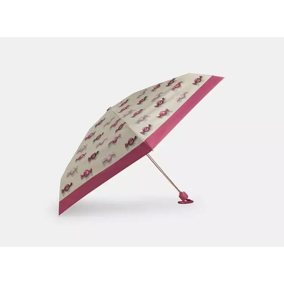 Coach Accessories - Coach Uv Protection Mini Umbrella
With Candy Print